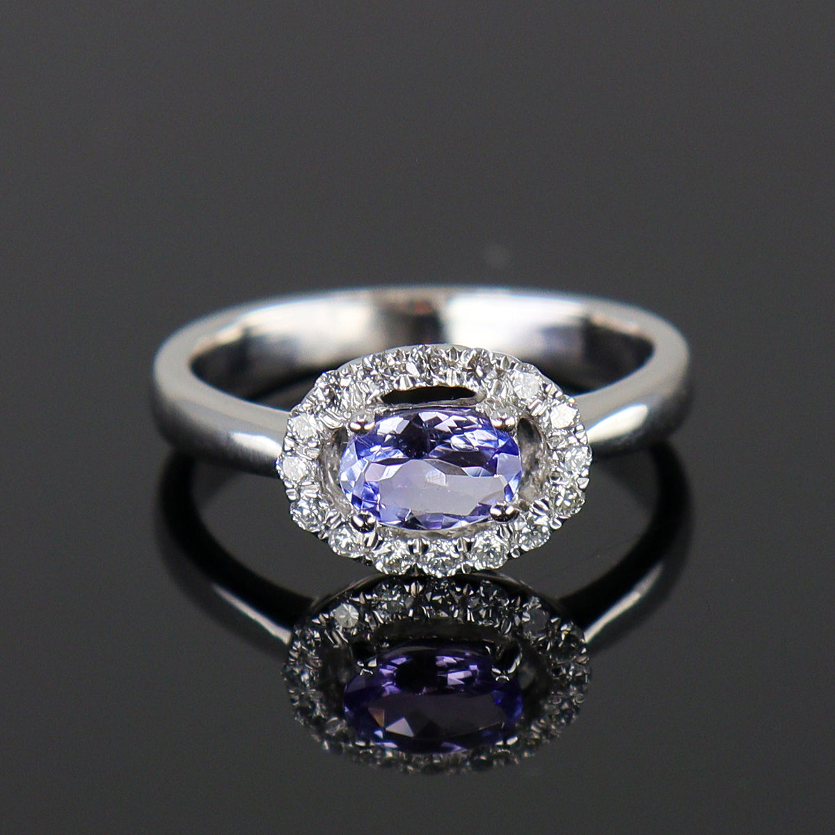 Pre-Owned 18ct White Gold Oval Tanzanite & Diamond Cluster Ring