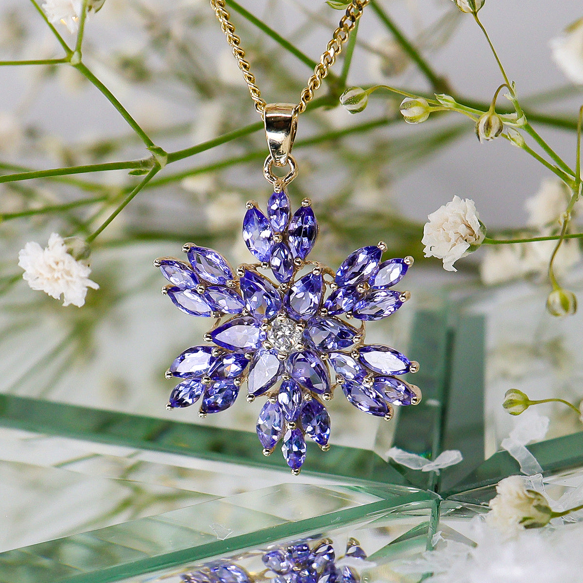 Pre-Owned 9ct Gold Multi Cut Tanzanite & Round Brilliant Cut Diamond Snowflake Pendant 18" Chain