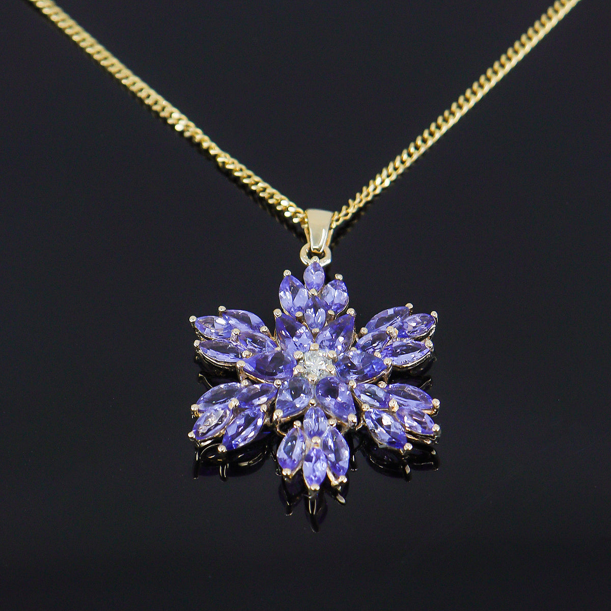 Pre-Owned 9ct Gold Multi Cut Tanzanite & Round Brilliant Cut Diamond Snowflake Pendant 18" Chain