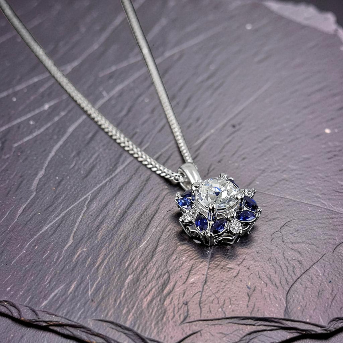 Pre-Owned Platinum Old Cut Diamond & Marquise Sapphire Flower Pendant on 18"  Spiga Chain