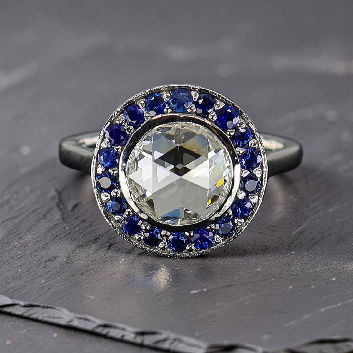Pre-Owned Platinum Ap. 1.11ct Rose Cut Diamond & Sapphire Halo Ring