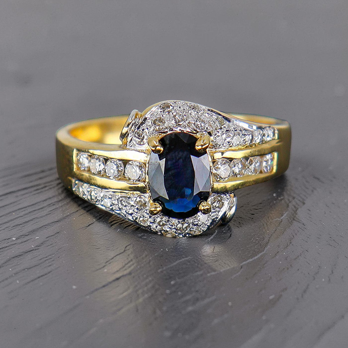 Pre-Owned 18ct Yellow Gold Four Claw Set Oval Sapphire Grain, Channel & Rub Round Brilliant Diamonds