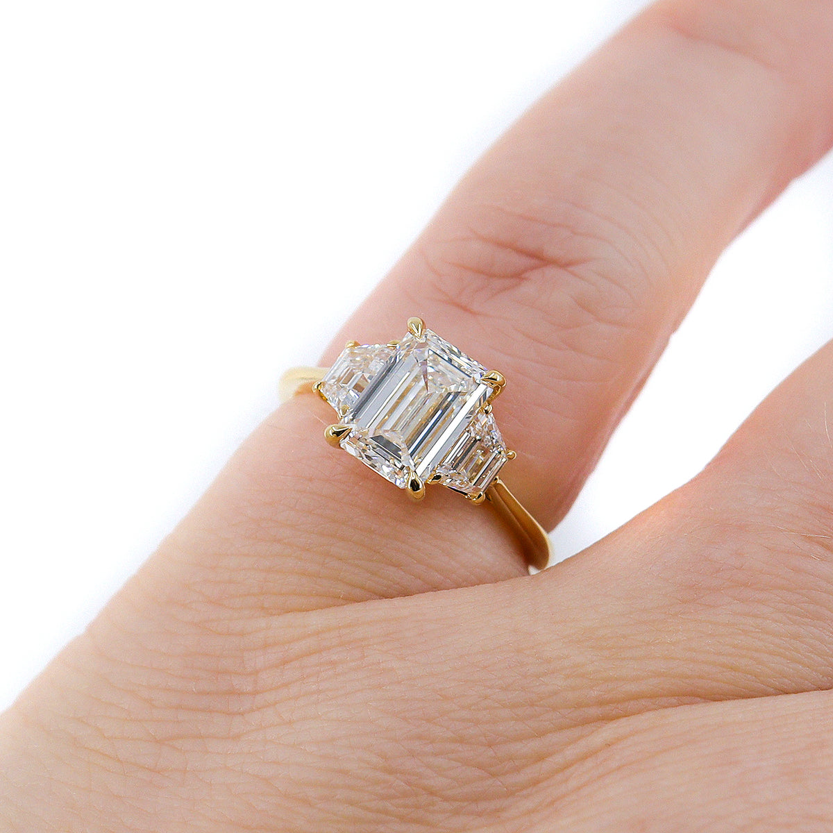 18ct Yellow Gold 2.56ct Lab Grown Emerald & Trapezoid Diamond Three Stone Ring