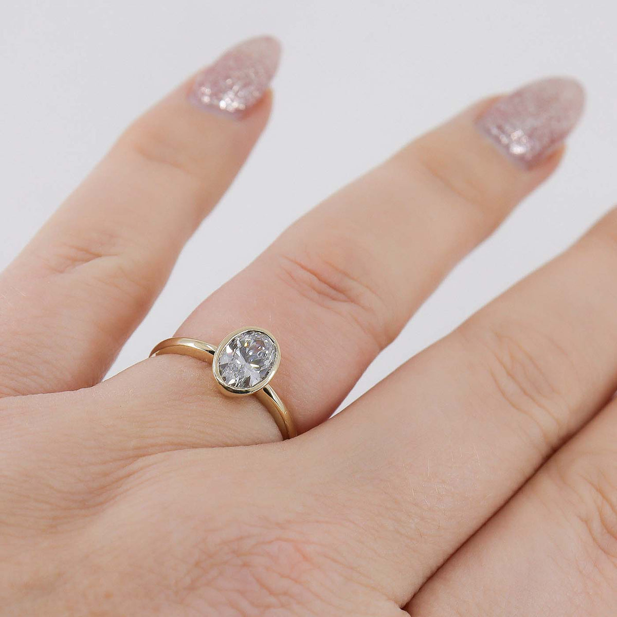 9ct Yellow Gold 1.00ct Lab Grown Diamond Certificated Oval Cut Rub Set Solitaire Ring