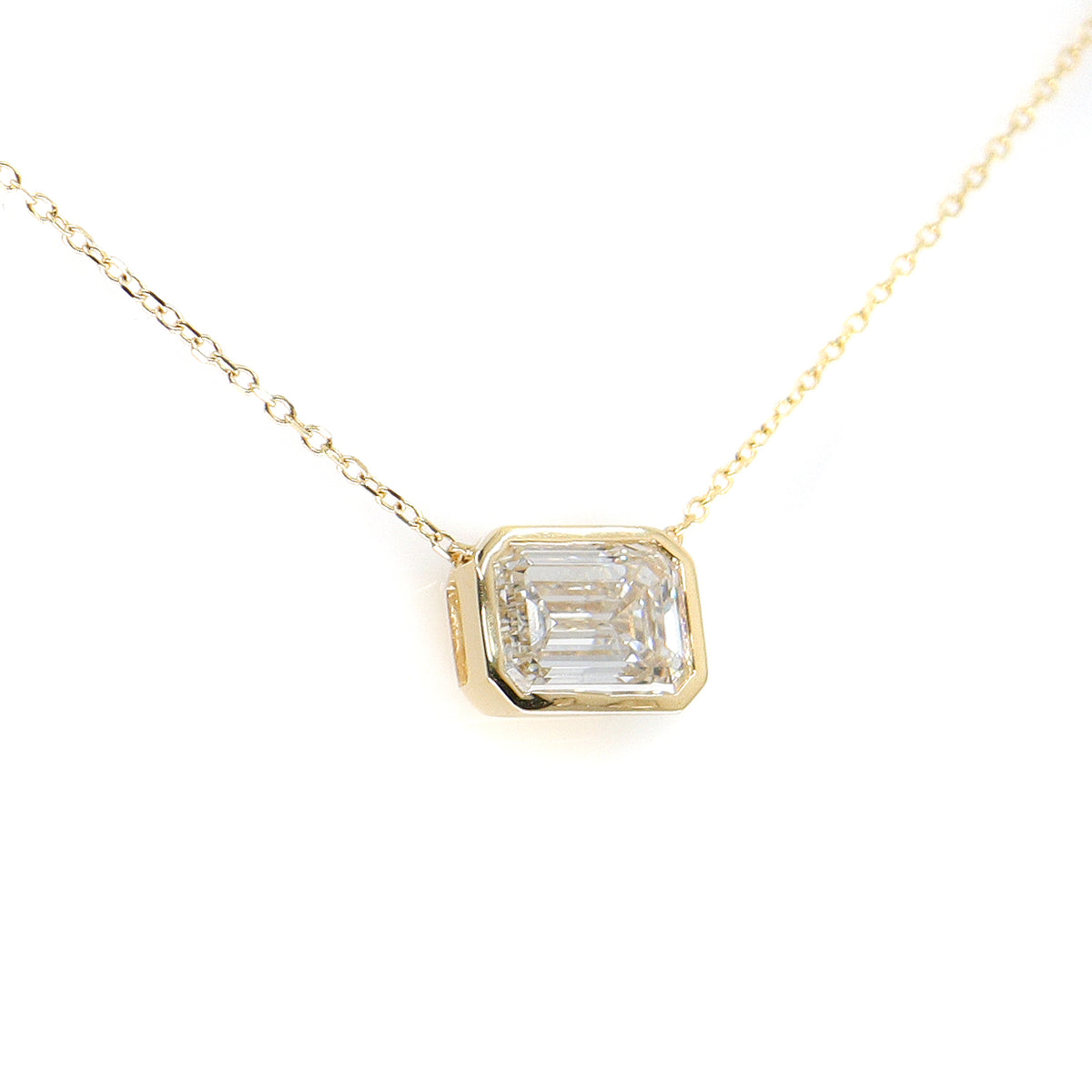 18ct Yellow Gold Lab Grown 2.00ct Emerald Cut Solitaire Rub Set Necklace on 16-17.5''  Trace Chain