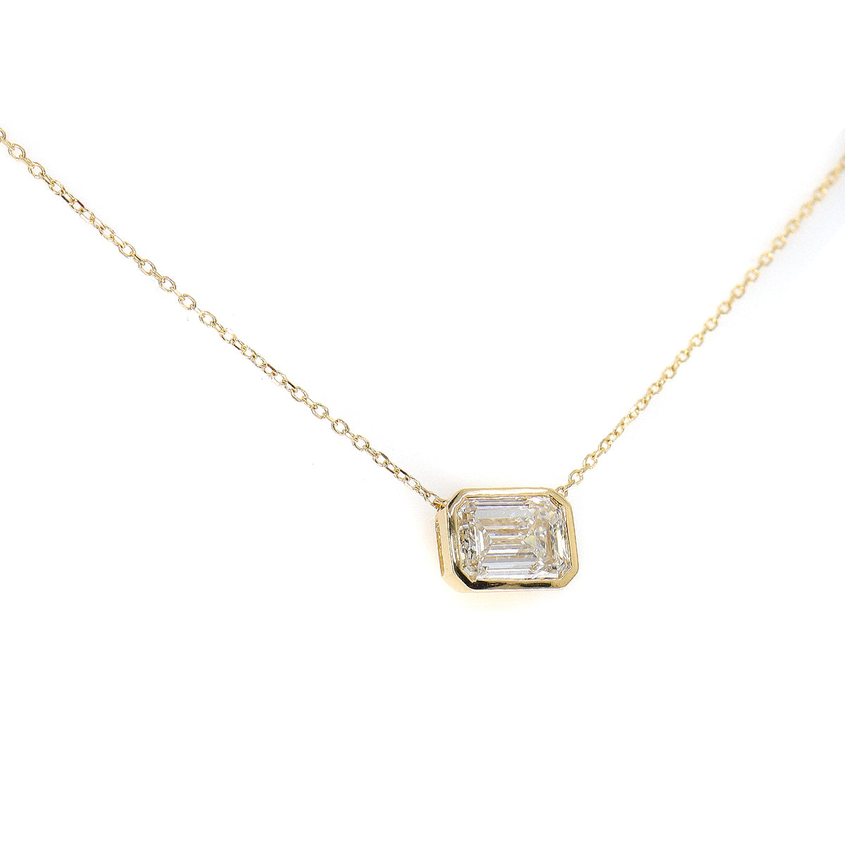 18ct Yellow Gold Lab Grown 2.00ct Emerald Cut Solitaire Rub Set Necklace on 16-17.5''  Trace Chain