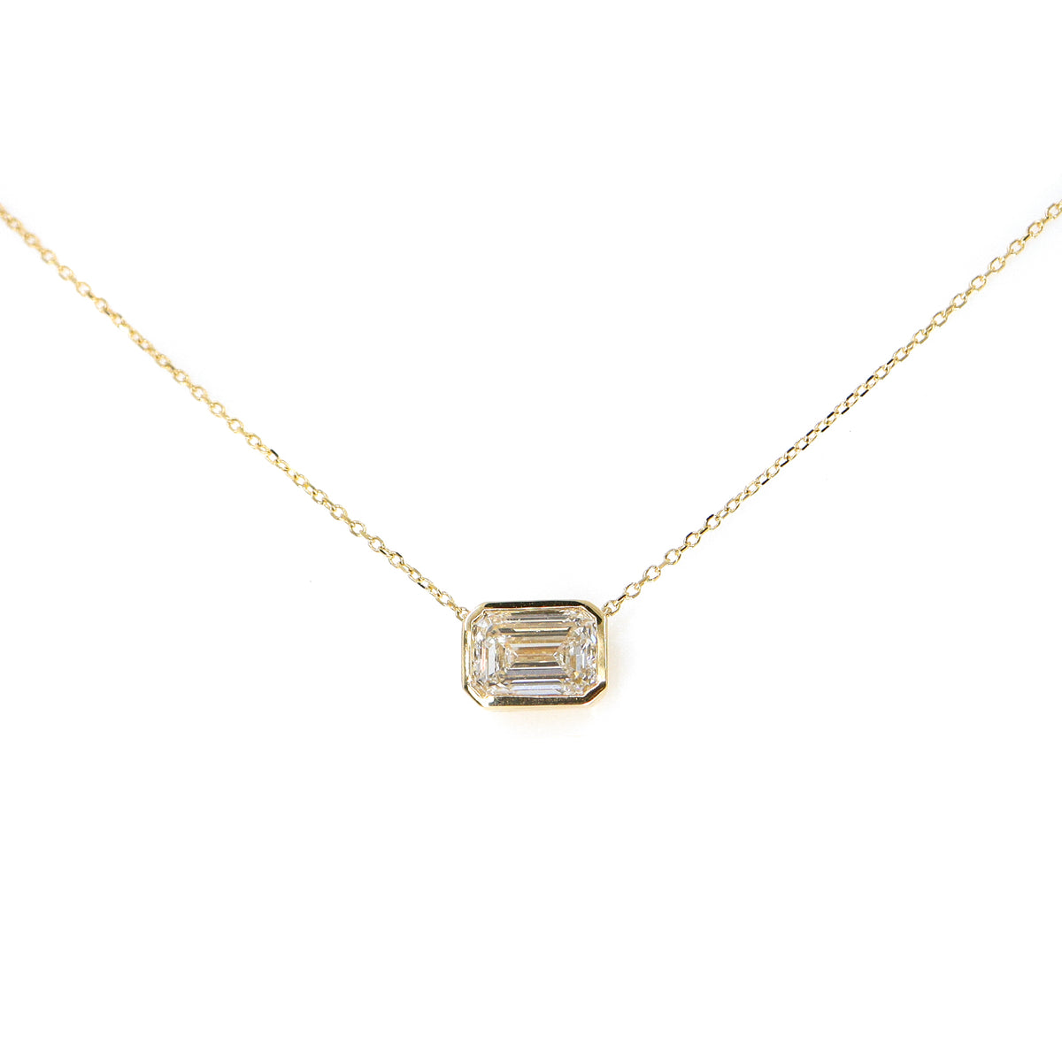 18ct Yellow Gold Lab Grown 2.00ct Emerald Cut Solitaire Rub Set Necklace on 16-17.5''  Trace Chain
