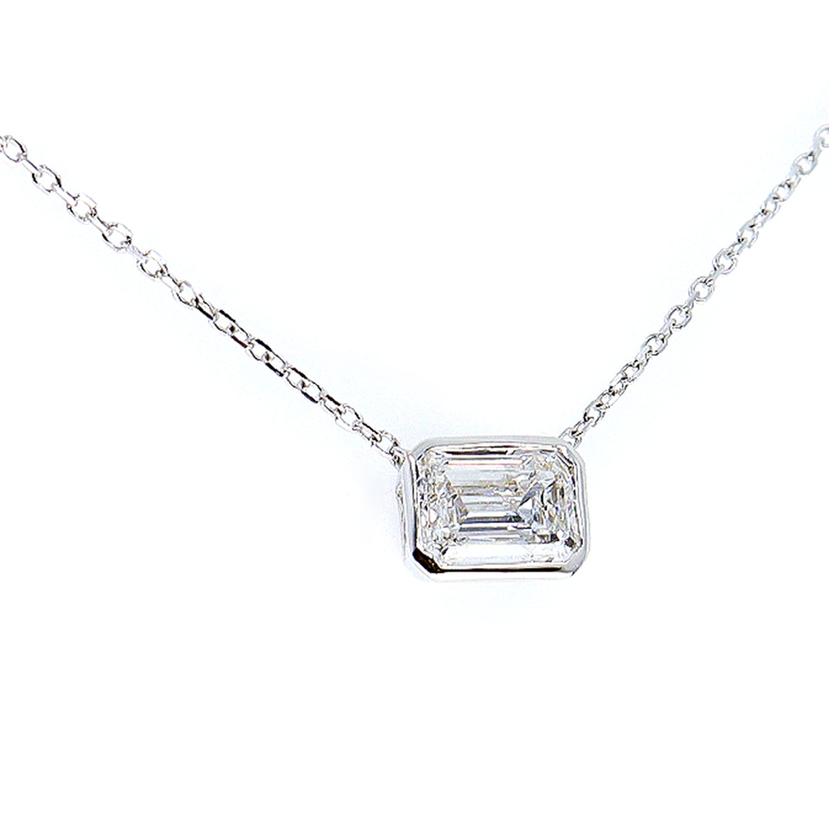 18ct White Gold Lab Grown 1.00ct Emerald Cut Solitaire Rub Set Necklace on 16-17.5'' Trace Chain