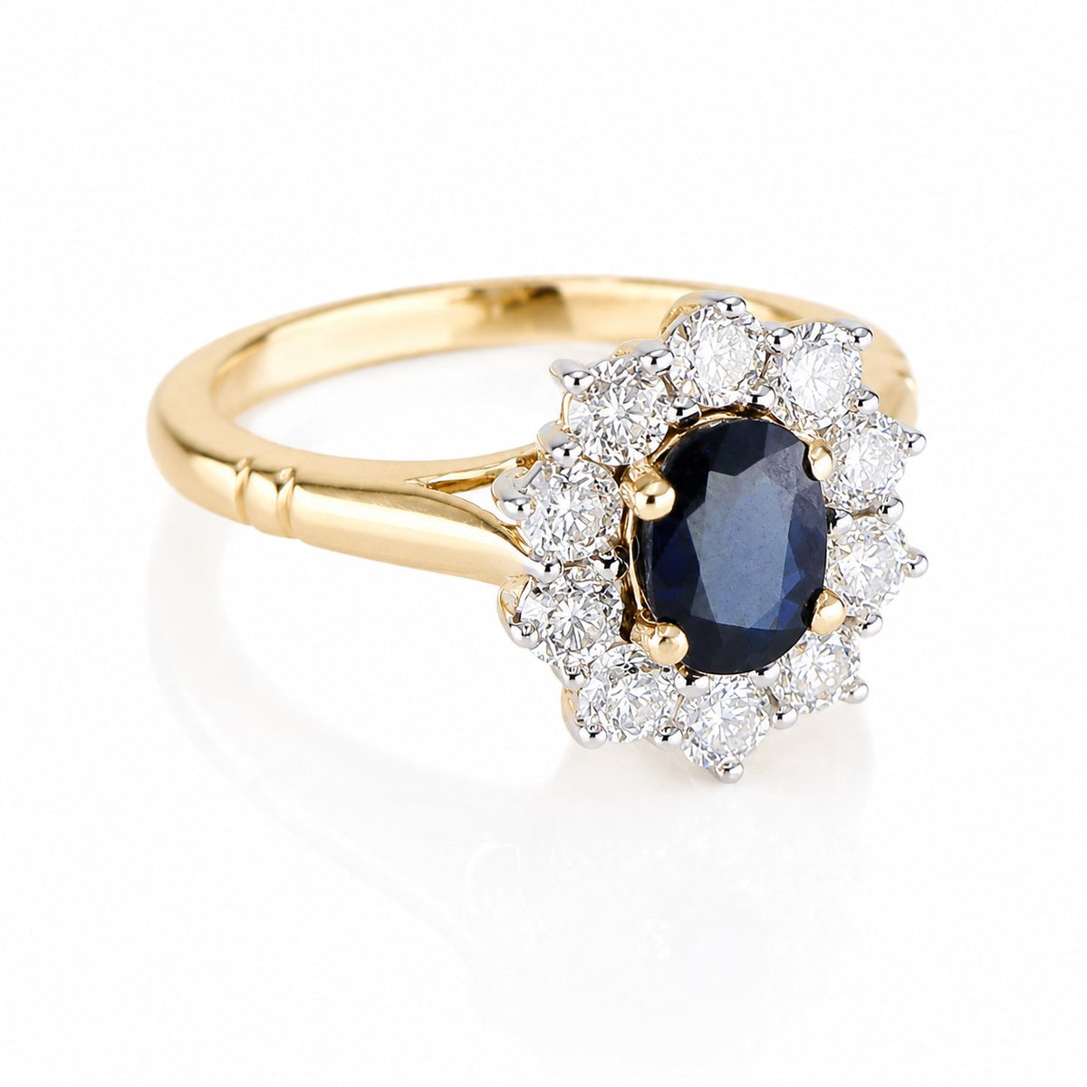 Pre-Owned 9ct Gold Oval Sapphire & Round Brilliant Cut Diamond Claw Set Cluster Ring