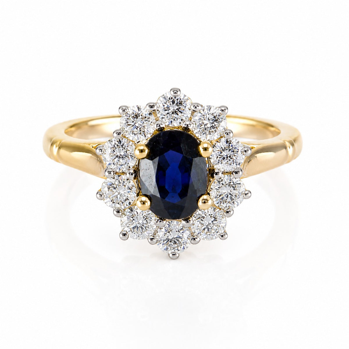 Pre-Owned 9ct Gold Oval Sapphire & Round Brilliant Cut Diamond Claw Set Cluster Ring