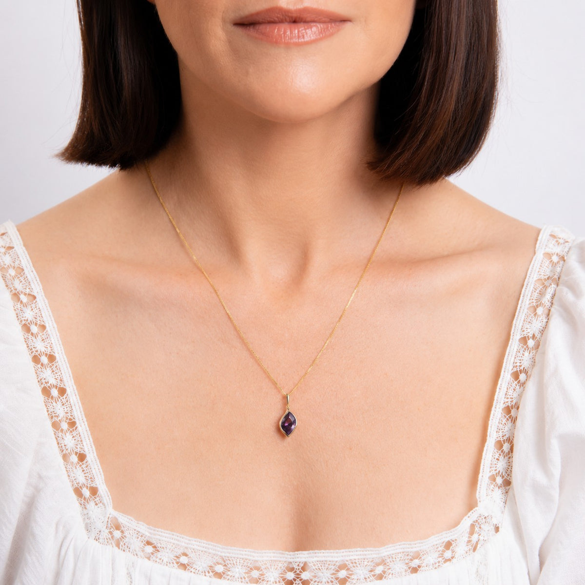 9ct Yellow Gold Flame Amethyst Pend