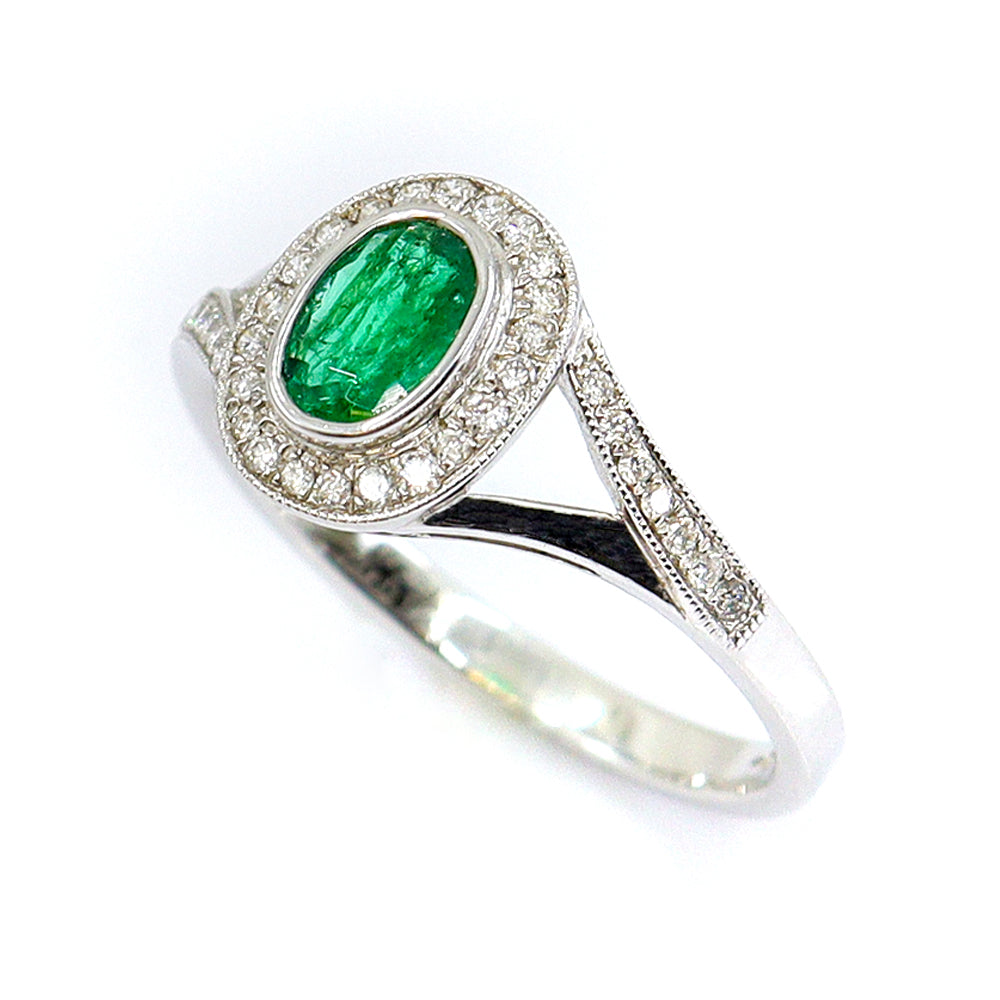 18ct White Gold 0.49ct Emerald & 0.17ct Diamond Oval Rubset Halo Ring