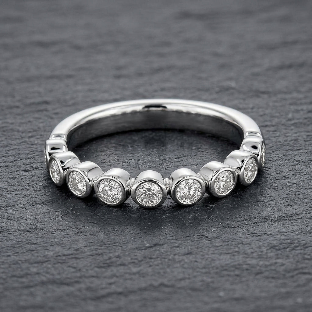 Pre-Owned Platinum Ap. 0.33ct TDW Diamond Graduated Channel Set Half Eternity Ring
