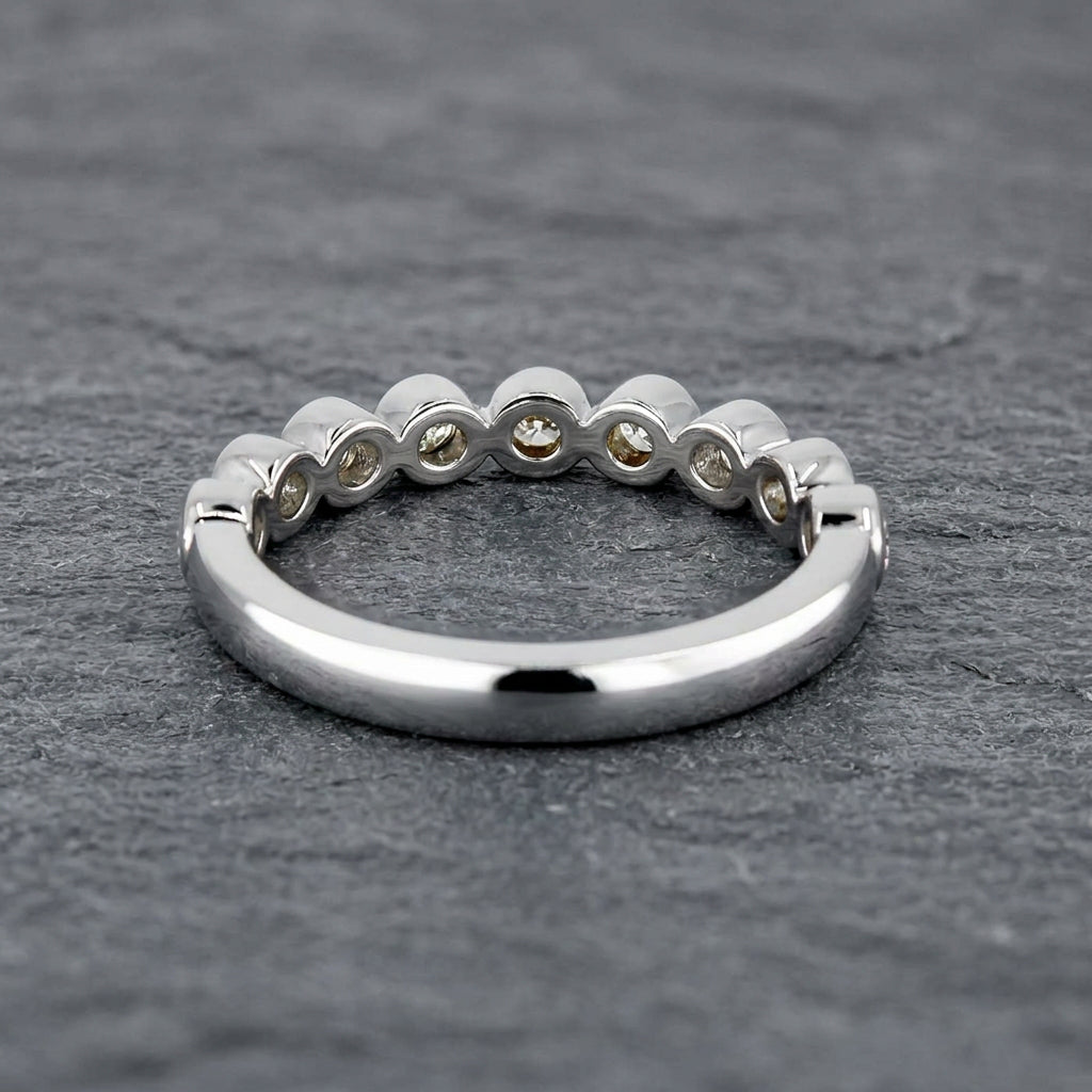 Pre-Owned Platinum Ap. 0.33ct TDW Diamond Graduated Channel Set Half Eternity Ring