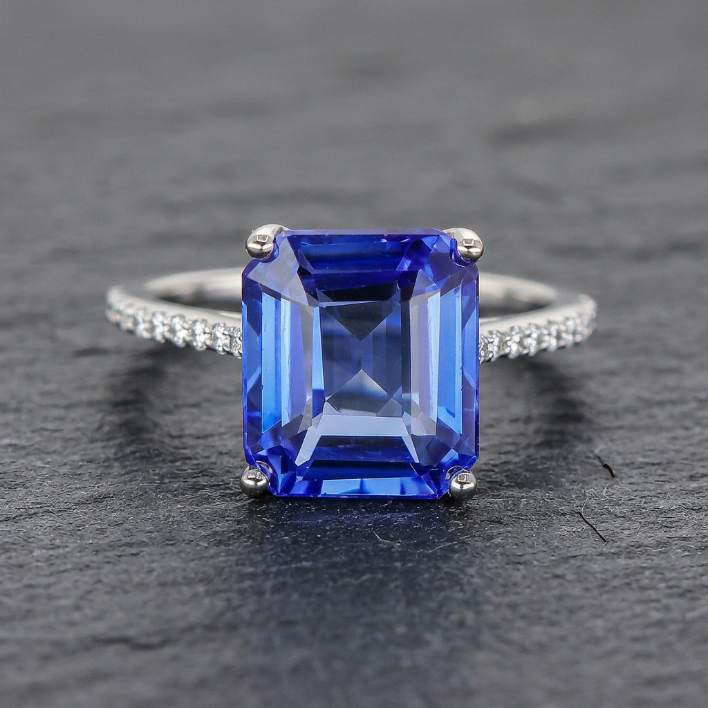 Pre-Owned 18ct White Gold Emerald Cut Sapphire & Diamond Ring
