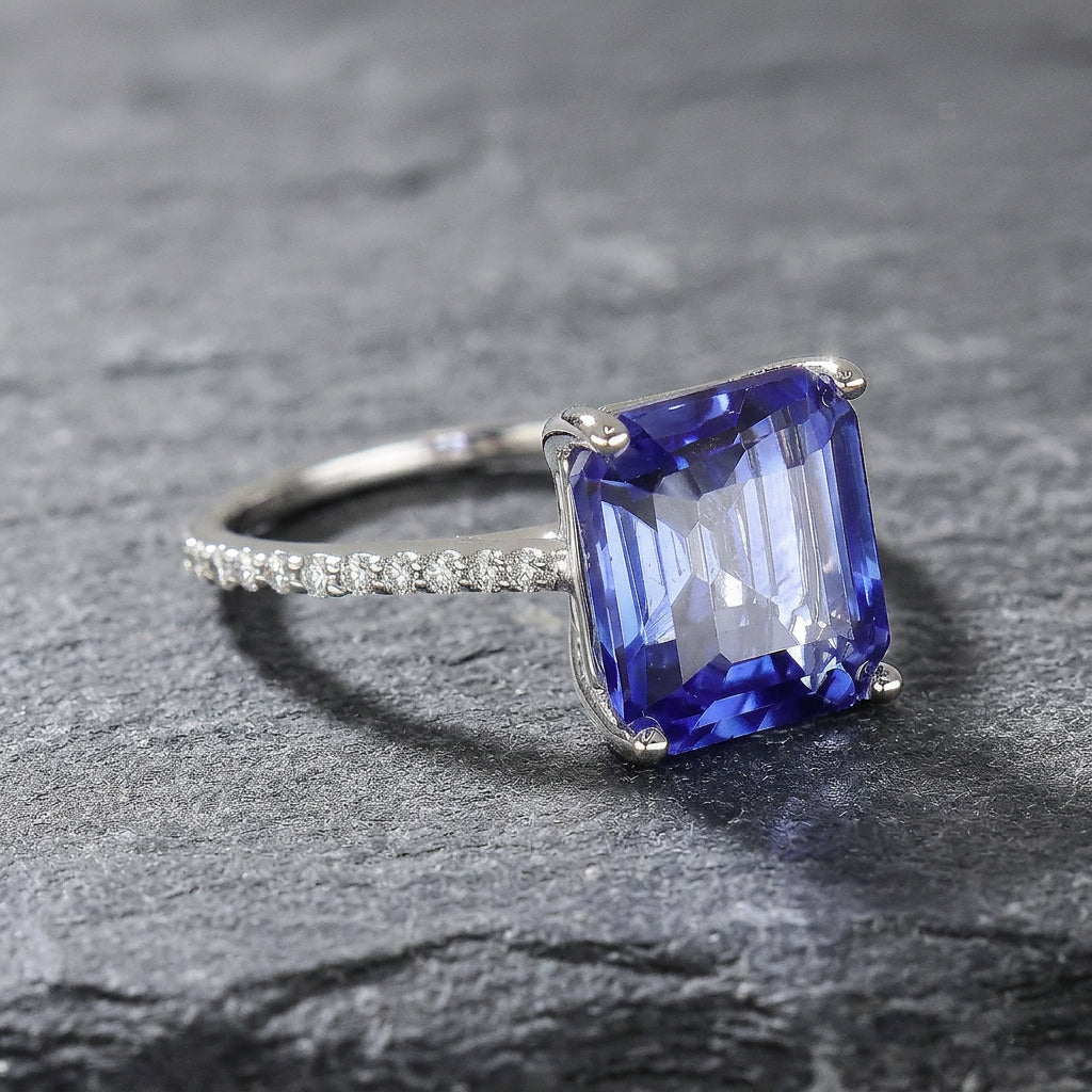 Pre-Owned 18ct White Gold Emerald Cut Sapphire & Diamond Ring