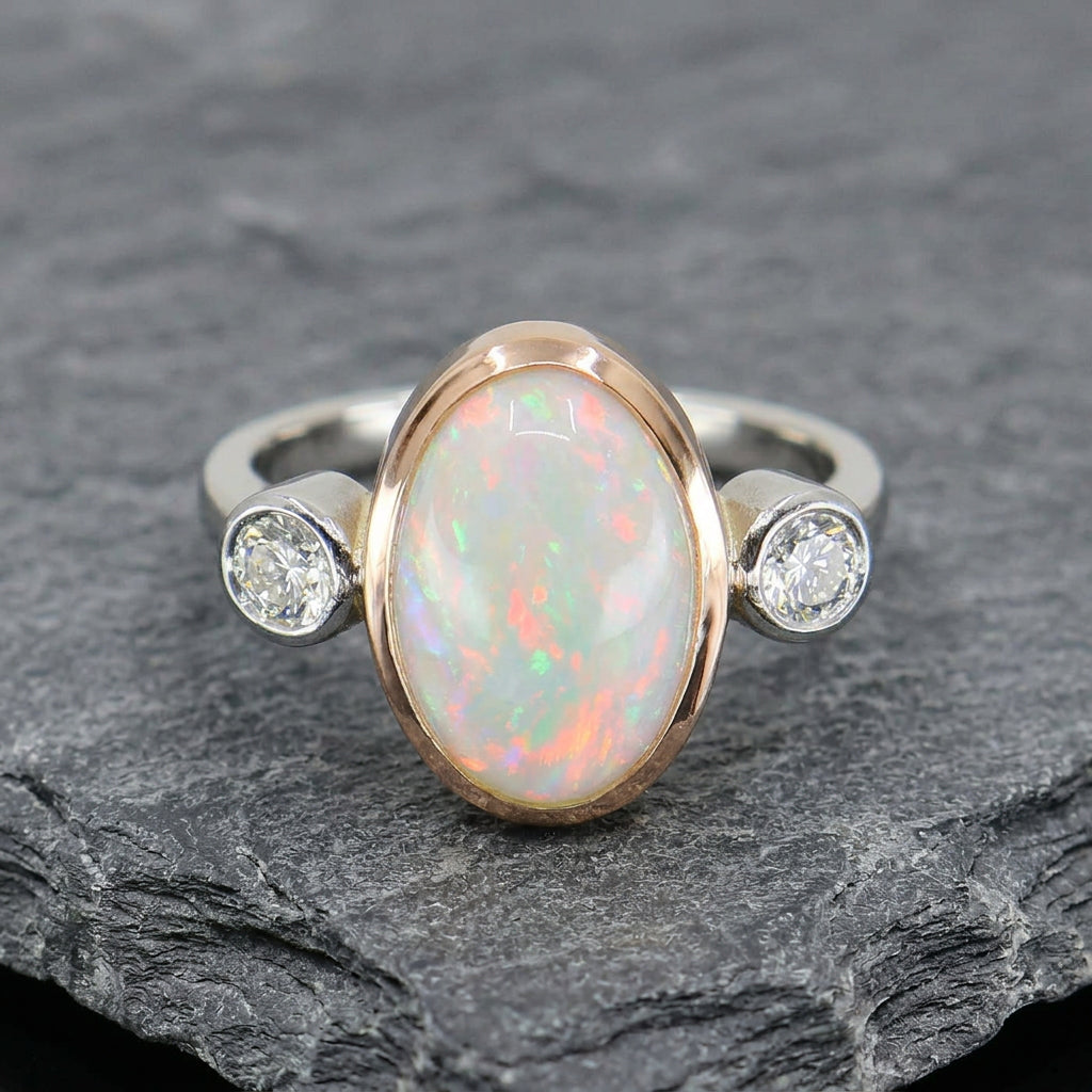 Pre-Owned Platinum & 18ct Rose Gold Oval Opal & Round Brilliant Cut Diamond Three Stone Ring