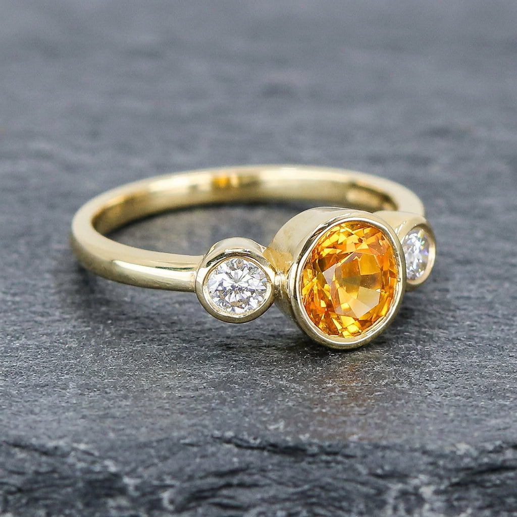 Pre-Owned 18ct Gold Oval Yellow Sapphire & Round Brilliant Cut Diamond Three Stone Ring