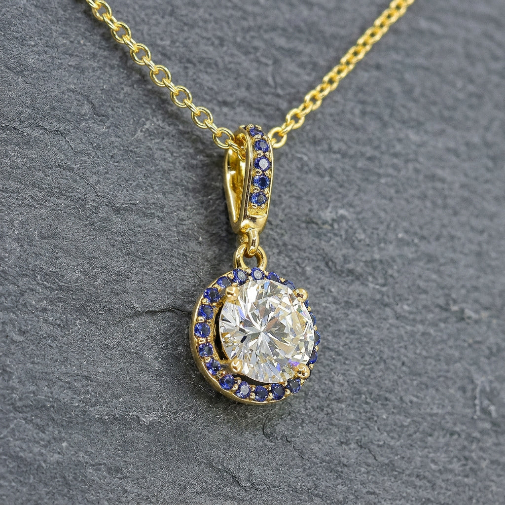 Pre-Owned 18ct Yellow Gold 0.98ct Diamond and Sapphire Pendant