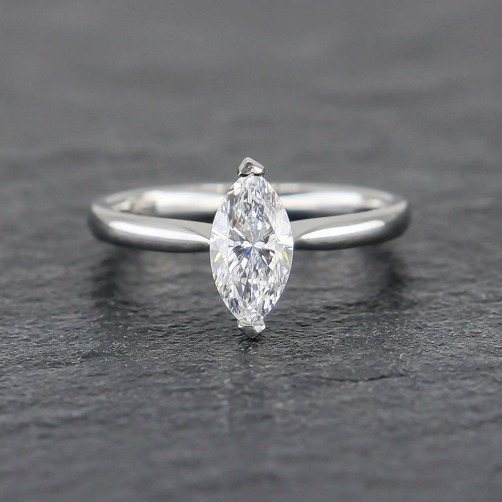 Pre-Owned Platinum Marquise Diamond Solitaire Ring
